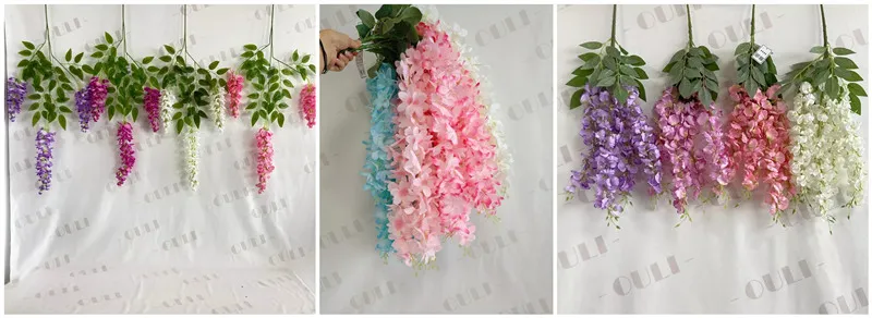 Ceiling decorated with white and purple fake wisteria flowers for immersive event experience