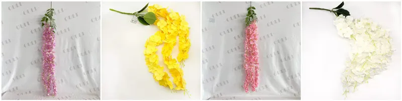 artificial wisteria garland with green foliage accents