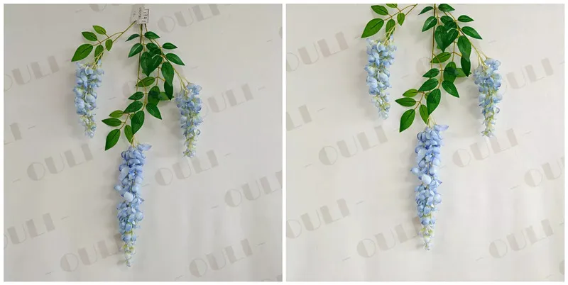 Minimalist balcony garden using pink hanging faux wisteria and potted plants