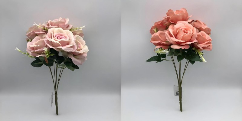 Close-up of fake rose bouquet for wedding with vibrant pink and red petals